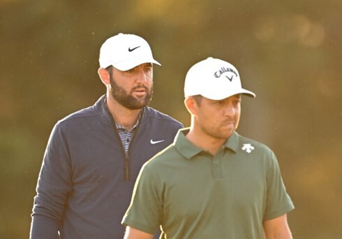 Two golf players.