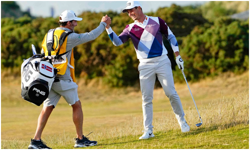 Two golf players with golf equipment.