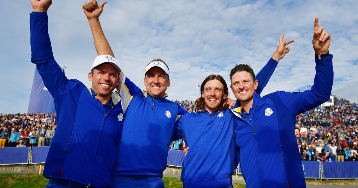 Four golfers on a golf course